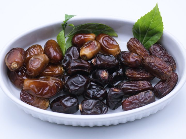 Black dates in a serving bowl