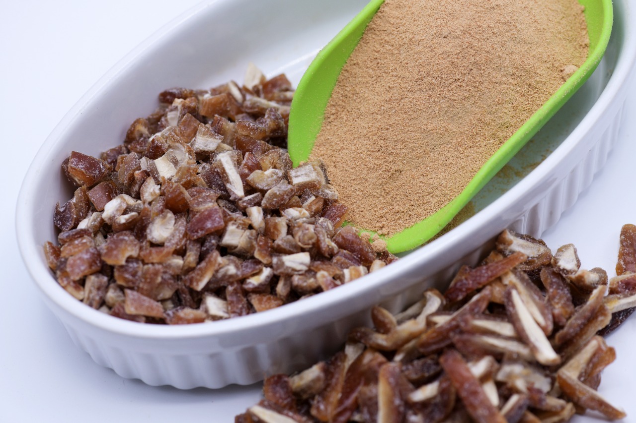 Chopped dates and date powder in a serving dish